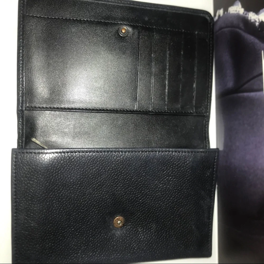 Longchamp black leather folding wallet‎